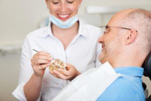 Nice patient smiling at doctor