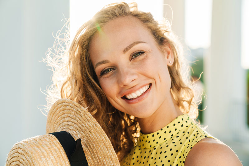 cosmetic dental patient after teeth whitening procedure
