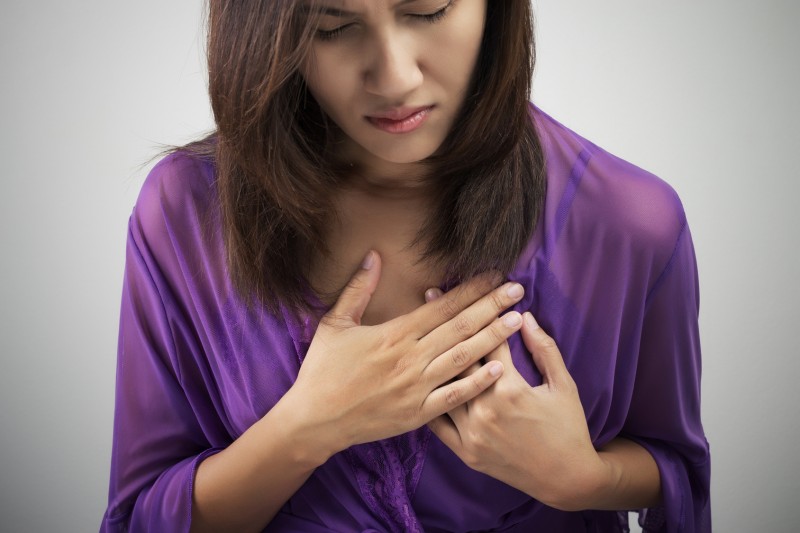Woman feeling a Heart Attack Coming on