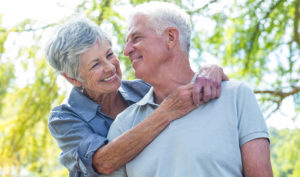 Happy elderly couple outdoors